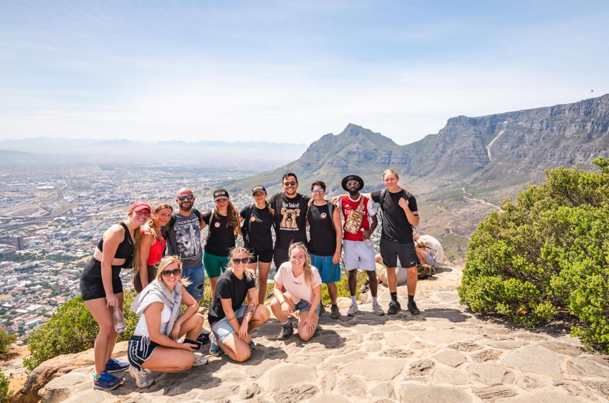 Never At Home Green Point Cape Town Exterior photo The team at Table Mountain, Cape Town, South Africa